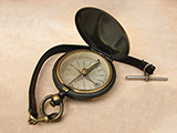 Late 19th Century brass pocket compass with T bar leather strap
